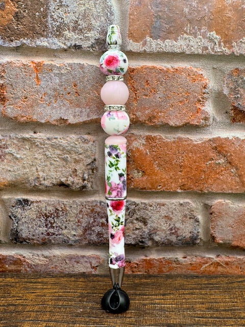 Pink floral pen with matching base